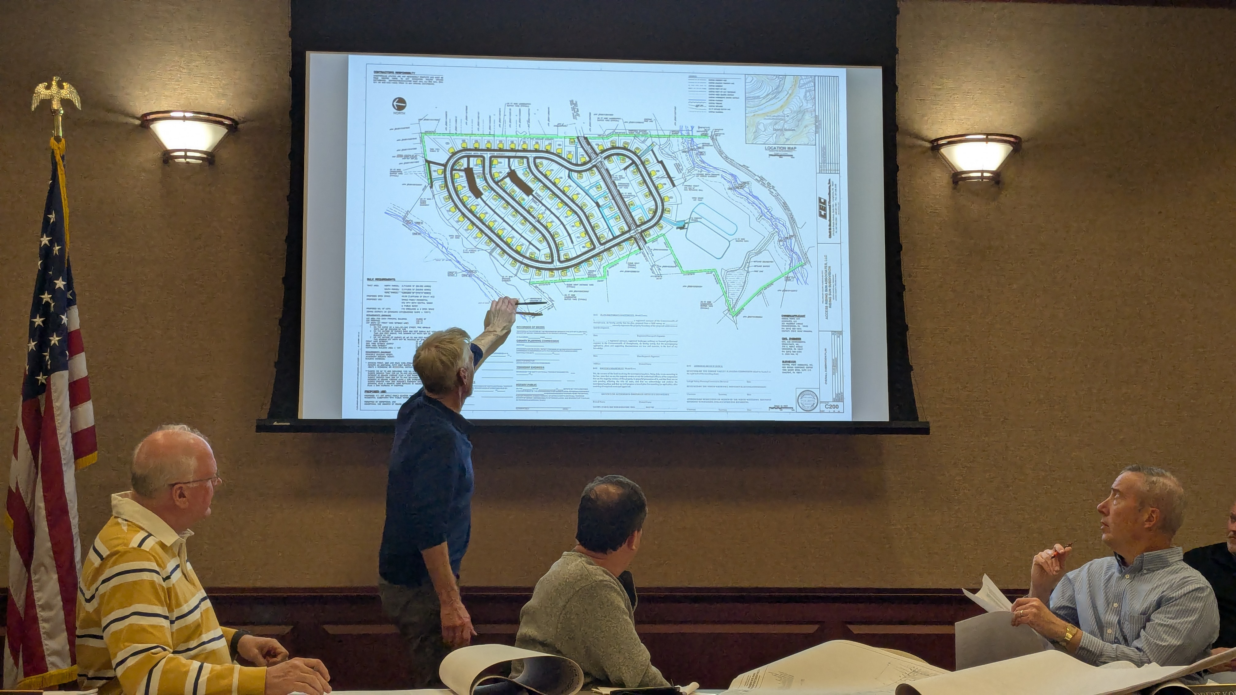 Engineers look at subdivision map